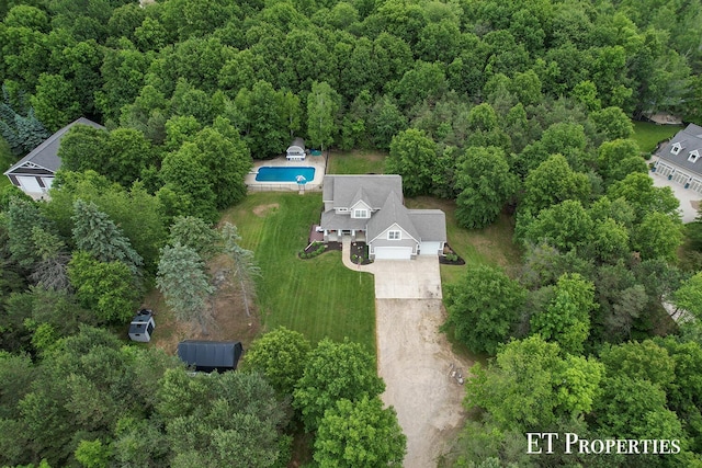 12150 W Devis Rd, West Olive, MI 49460 - drone / aerial view of a forest and a pool