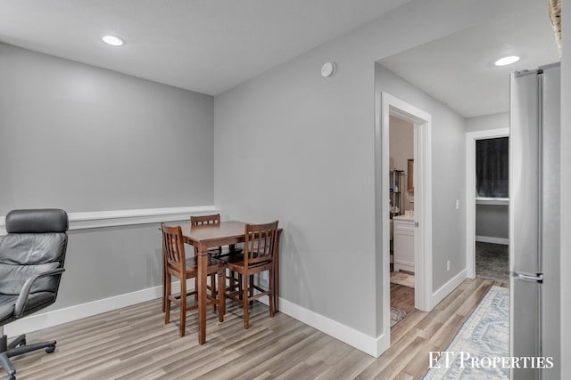12150 W Devis Rd, West Olive, MI 49460 - home office featuring wood finished floors and recessed lighting