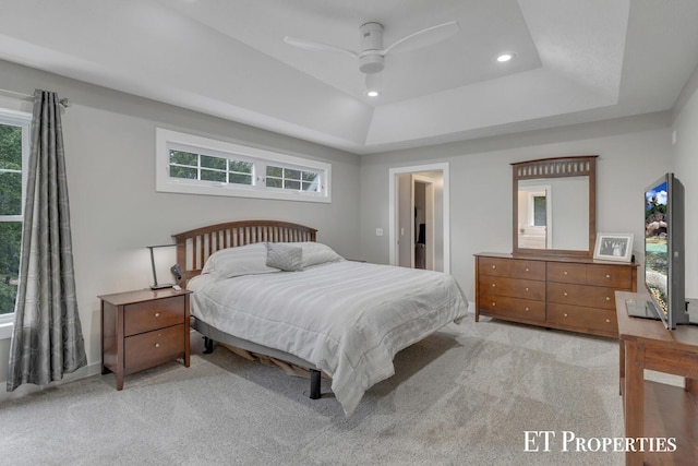 12150 W Devis Rd, West Olive, MI 49460 - bedroom featuring a raised ceiling, light carpet, recessed lighting, and ceiling fan