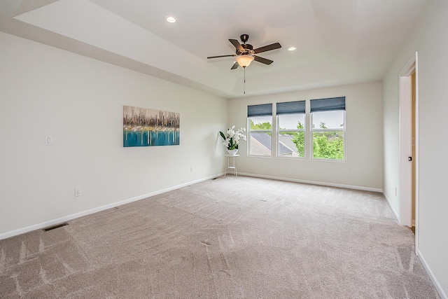 2767 St Regis Way, Ann Arbor, MI 48105 - unfurnished room featuring carpet, ceiling fan, recessed lighting, and a tray ceiling