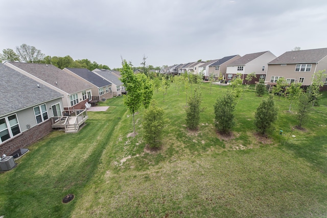 2767 St Regis Way, Ann Arbor, MI 48105 - view of grassy yard with a residential view and a wooden deck