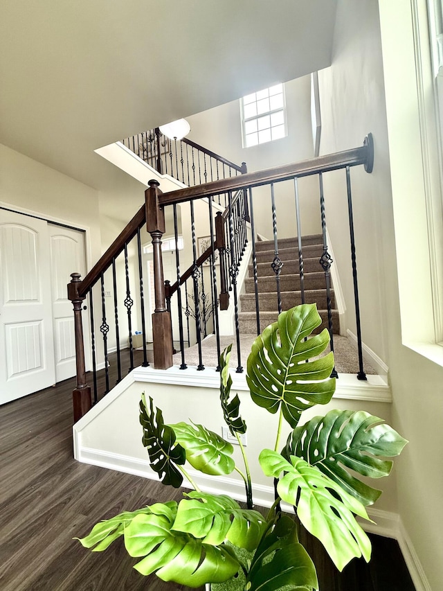2767 St Regis Way, Ann Arbor, MI 48105 - staircase featuring wood finished floors and baseboards