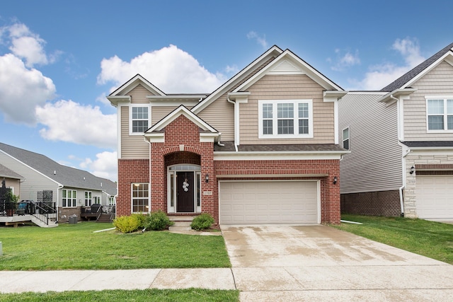 2767 St Regis Way, Ann Arbor, MI 48105 - traditional-style house featuring brick siding, a garage, concrete driveway, and a front lawn