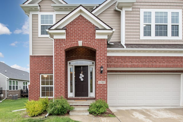 2767 St Regis Way, Ann Arbor, MI 48105 - view of front of property featuring brick siding and driveway