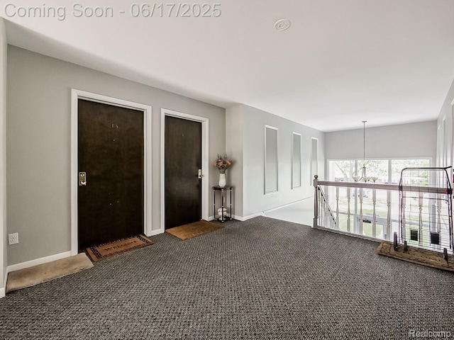 16820 Edloytom Way Unit 172, Clinton Township, MI 48038 - unfurnished room with dark colored carpet and a chandelier