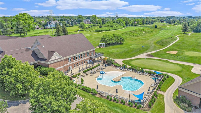 712 Dornoch Dr, Ann Arbor, MI 48103 - bird's eye view of a pool and a tree filled landscape