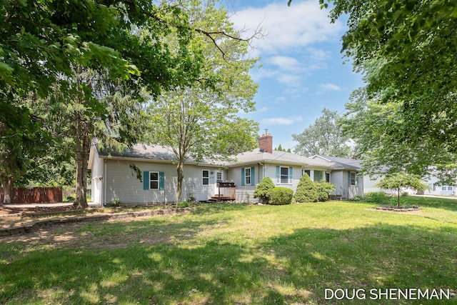 3747 Leonard St NW, Grand Rapids, MI 49534 - rear view of property with a chimney