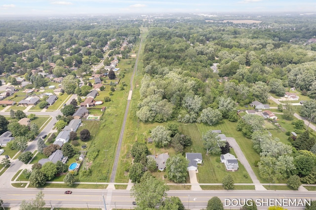 3747 Leonard St NW, Grand Rapids, MI 49534 - aerial perspective of suburban area featuring a heavily wooded area