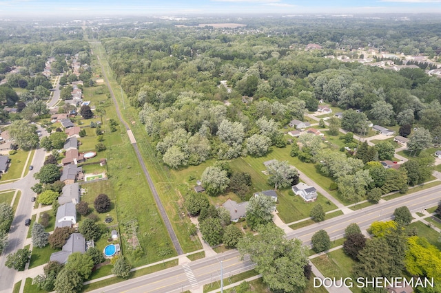 3747 Leonard St NW, Grand Rapids, MI 49534 - aerial view of property and surrounding area with a forest