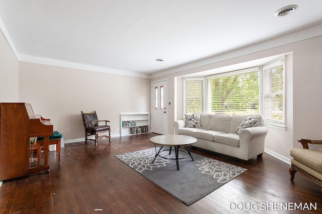 3747 Leonard St NW, Grand Rapids, MI 49534 - living area with wood finished floors and ornamental molding