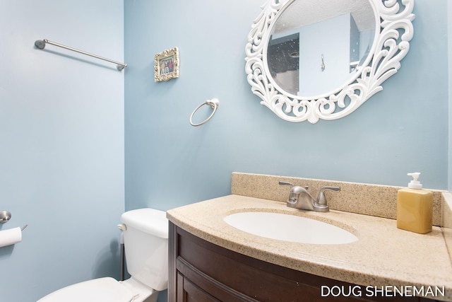3747 Leonard St NW, Grand Rapids, MI 49534 - bathroom with toilet and vanity