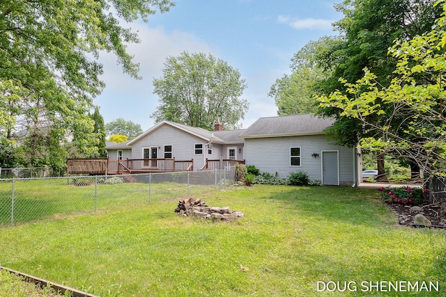 3747 Leonard St NW, Grand Rapids, MI 49534 - rear view of property with a wooden deck and a chimney