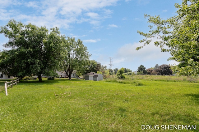 3747 Leonard St NW, Grand Rapids, MI 49534 - view of yard with an outbuilding