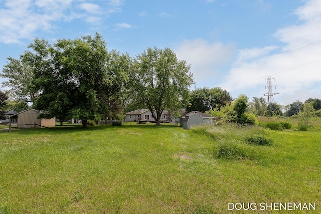 3747 Leonard St NW, Grand Rapids, MI 49534 - view of yard featuring a storage shed