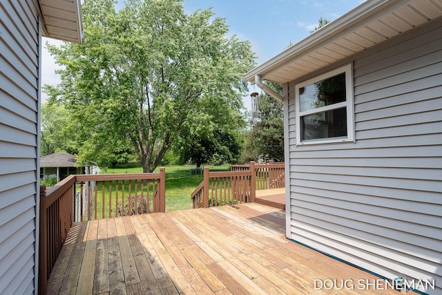3747 Leonard St NW, Grand Rapids, MI 49534 - deck featuring a lawn