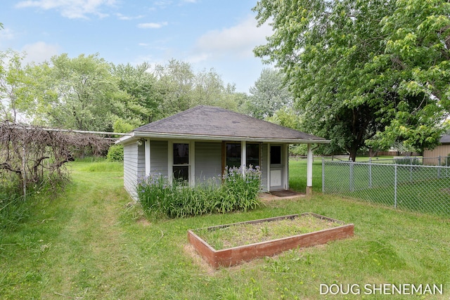 3747 Leonard St NW, Grand Rapids, MI 49534 - view of outdoor structure featuring a vegetable garden