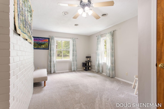 3747 Leonard St NW, Grand Rapids, MI 49534 - sitting room featuring carpet and a ceiling fan