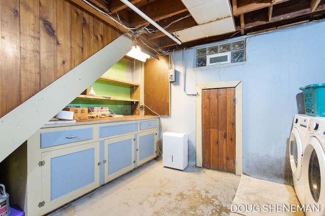 3747 Leonard St NW, Grand Rapids, MI 49534 - laundry room featuring independent washer and dryer and cabinet space