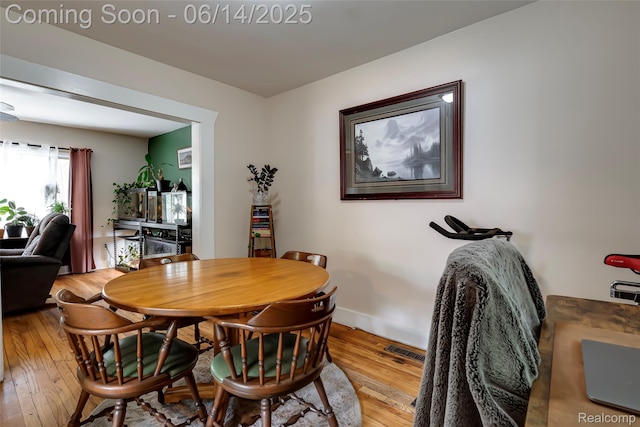 1217 E Madge Ave, Hazel Park, MI 48030 - dining area with hardwood / wood-style floors and baseboards