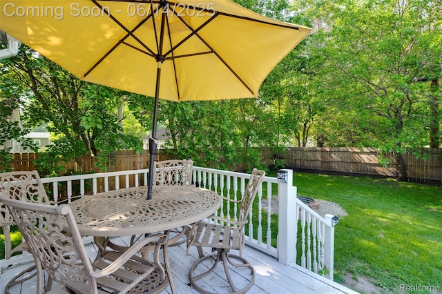 1217 E Madge Ave, Hazel Park, MI 48030 - deck with outdoor dining area and a fenced backyard