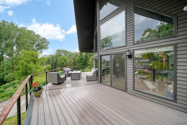13832 Grandview Dr, Cement City, MI 49233 - deck with an outdoor hangout area
