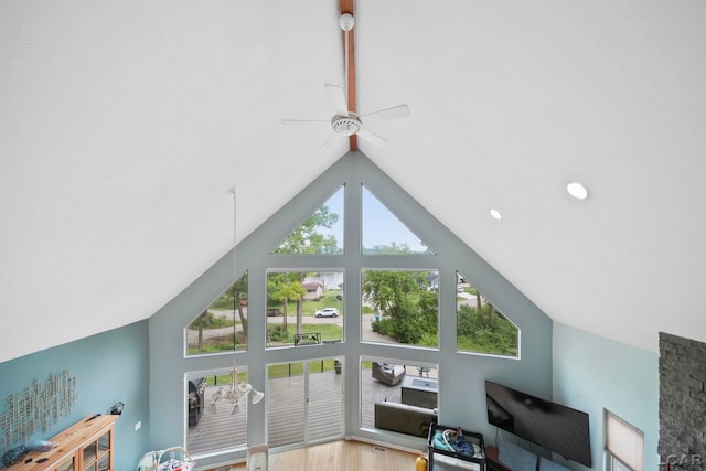 13832 Grandview Dr, Cement City, MI 49233 - living room featuring a ceiling fan, high vaulted ceiling, wood finished floors, and recessed lighting