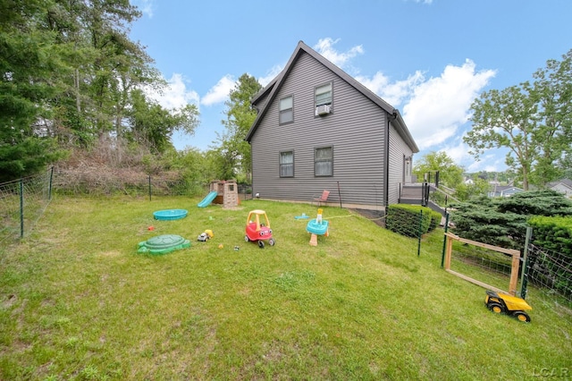13832 Grandview Dr, Cement City, MI 49233 - back of house with a playground