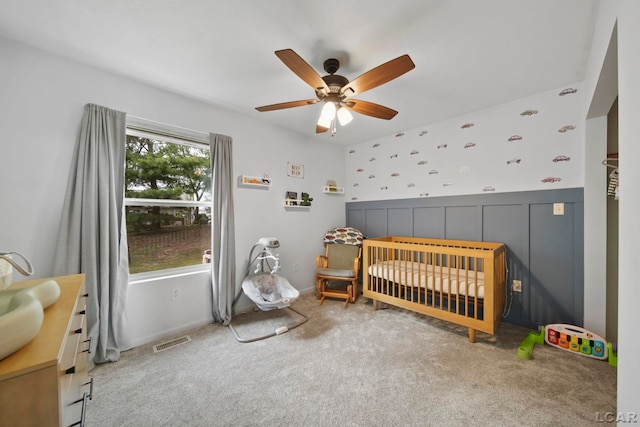 13832 Grandview Dr, Cement City, MI 49233 - bedroom featuring a nursery area, carpet floors, and ceiling fan