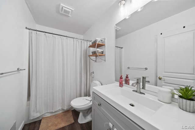 13832 Grandview Dr, Cement City, MI 49233 - bathroom featuring vanity, wood finished floors, and shower / bathtub combination with curtain