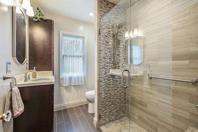 2104 Winchell Dr, Ann Arbor, MI 48104 - full bath featuring vanity, a stall shower, and recessed lighting