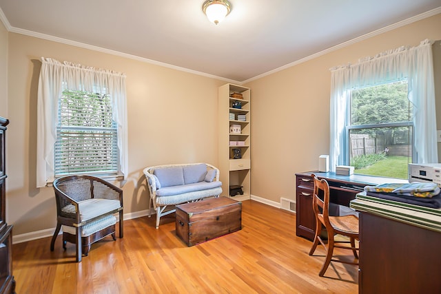 2104 Winchell Dr, Ann Arbor, MI 48104 - office area featuring light wood-style floors, healthy amount of natural light, and crown molding