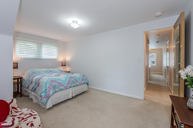 2104 Winchell Dr, Ann Arbor, MI 48104 - bedroom with light colored carpet and multiple windows