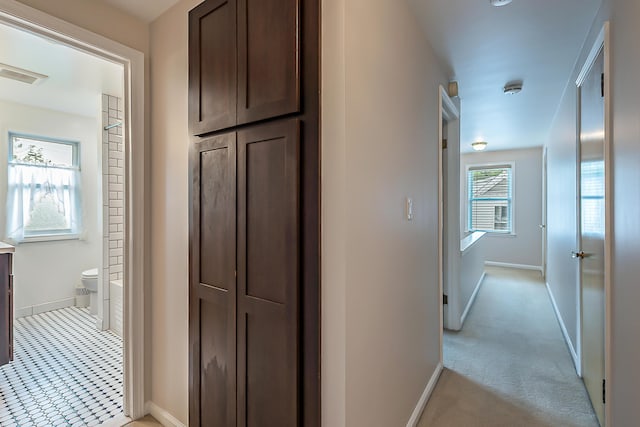 2104 Winchell Dr, Ann Arbor, MI 48104 - hall featuring baseboards and light colored carpet