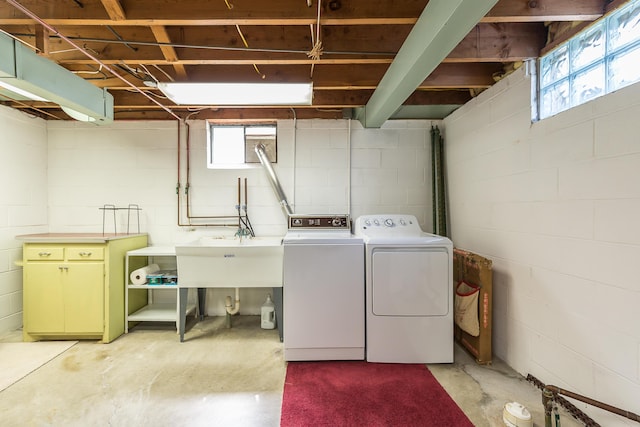 2104 Winchell Dr, Ann Arbor, MI 48104 - washroom with washer and dryer and concrete block wall