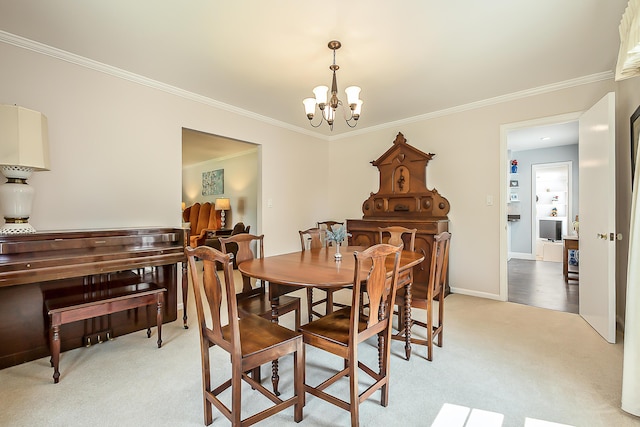 2104 Winchell Dr, Ann Arbor, MI 48104 - dining space featuring light carpet, a chandelier, and crown molding