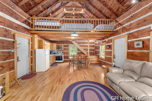 8607 S Ferris Ave, Newaygo, MI 49337 - living room featuring wooden walls, light wood-style floors, a wood ceiling with exposed beams, and high vaulted ceiling