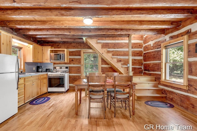 8607 S Ferris Ave, Newaygo, MI 49337 - kitchen with white appliances, light wood-style floors, a wood ceiling with exposed beams, light brown cabinets, and light countertops