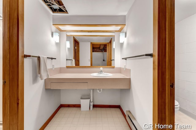 8607 S Ferris Ave, Newaygo, MI 49337 - bathroom with a sink and a baseboard radiator