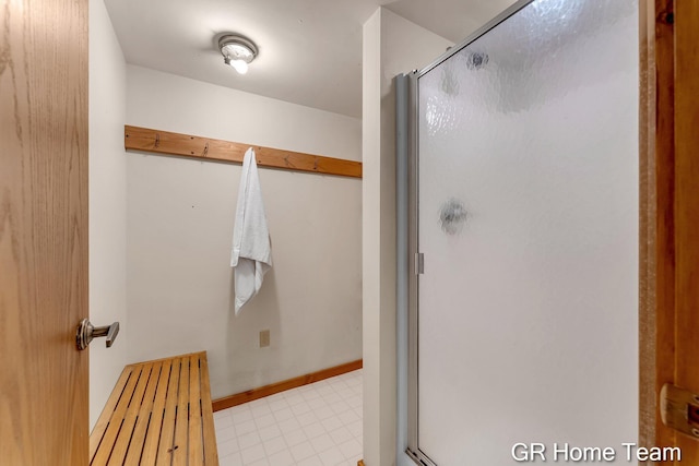 8607 S Ferris Ave, Newaygo, MI 49337 - bathroom with a stall shower and tile patterned floors
