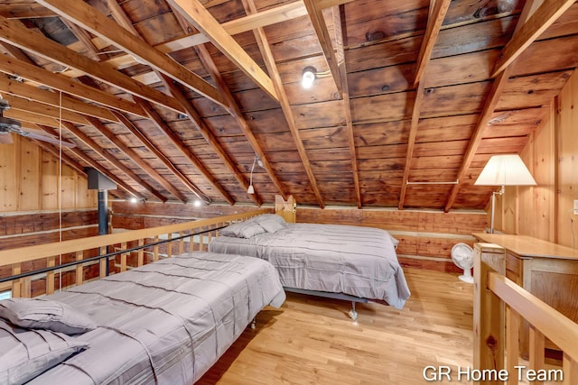 8607 S Ferris Ave, Newaygo, MI 49337 - bedroom featuring vaulted ceiling, wooden ceiling, wood walls, and wood finished floors