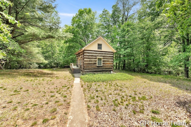 8607 S Ferris Ave, Newaygo, MI 49337 - view of yard with a wooded view