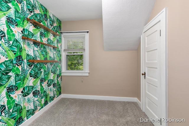 1448 Hall St SE, Grand Rapids, MI 49506 - carpeted empty room featuring baseboards