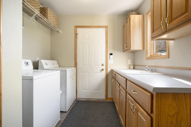 78 Capercaillie Ln, Battle Creek, MI 49014 - laundry area featuring washing machine and clothes dryer and cabinet space