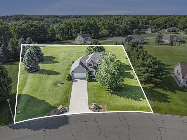 78 Capercaillie Ln, Battle Creek, MI 49014 - aerial view of property's location with property boundaries highlighted and a heavily wooded area