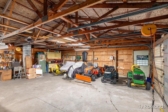 10667 220th Ave, Big Rapids, MI 49307 - garage featuring freestanding refrigerator