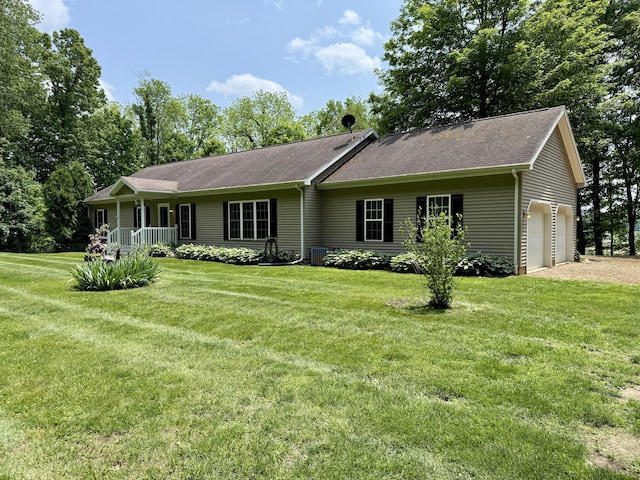 27774 N D Dr, Albion, MI 49224 - single story home featuring a front lawn, a porch, driveway, a garage, and roof with shingles