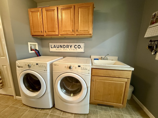 27774 N D Dr, Albion, MI 49224 - laundry area with cabinet space, separate washer and dryer, and light tile patterned floors