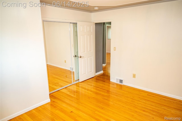 30320 Moulin Ave, Warren, MI 48088 - unfurnished bedroom with light wood-style floors and a closet