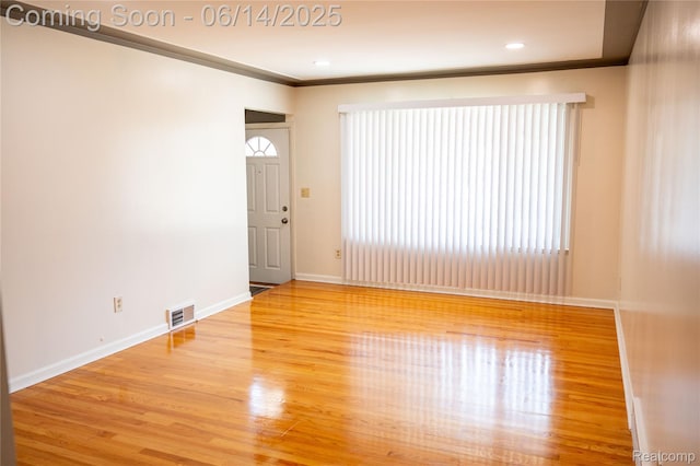30320 Moulin Ave, Warren, MI 48088 - unfurnished room with wood finished floors, crown molding, and recessed lighting