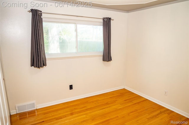 30320 Moulin Ave, Warren, MI 48088 - empty room with wood finished floors and baseboards